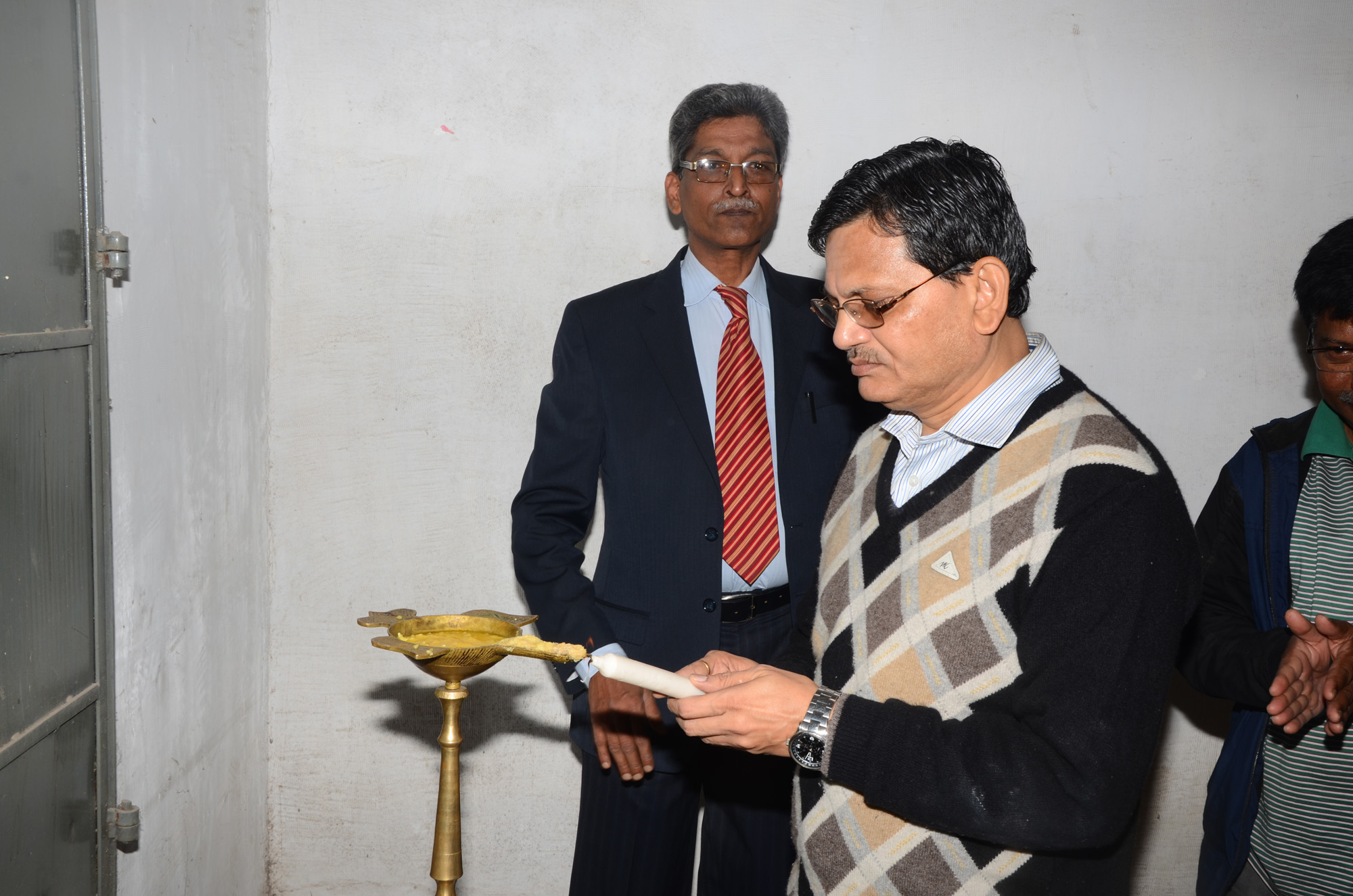 Lightening the lamp by Prof. Sudhanshu Sekhar Rath, OSD, G.M. University at 1st Induction Meeting of OSOU at G.M. University Campus.